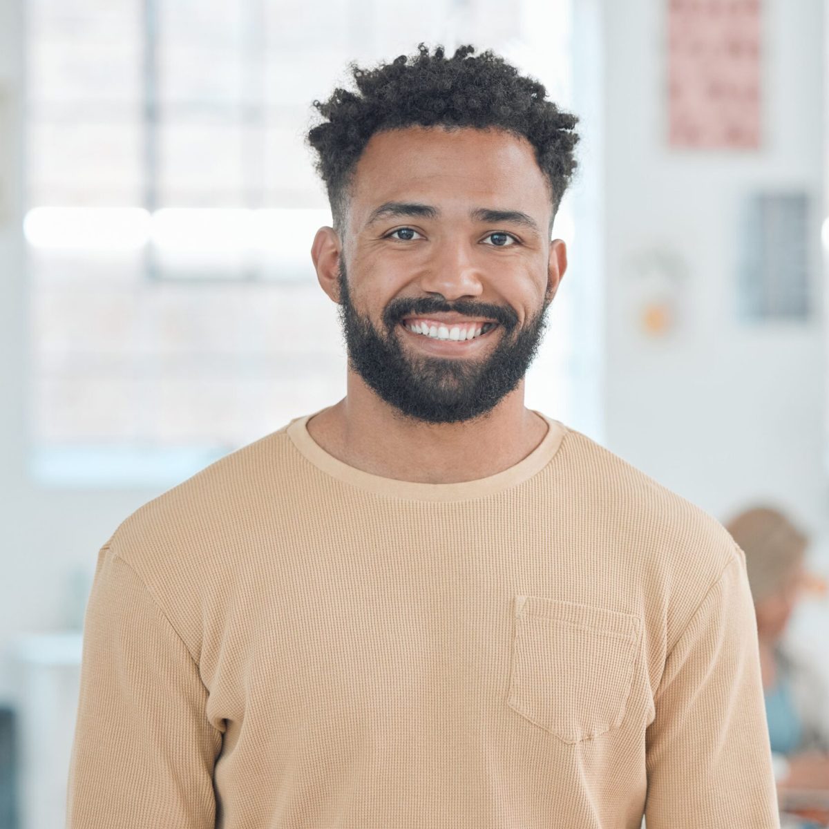 portrait-of-a-cheerful-mixed-race-businessman-stan-2024-10-22-16-12-14-utc-2-scaled-e1740353798190.jpg
